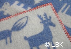 Wiegdeken Forest wol blauw afwerking